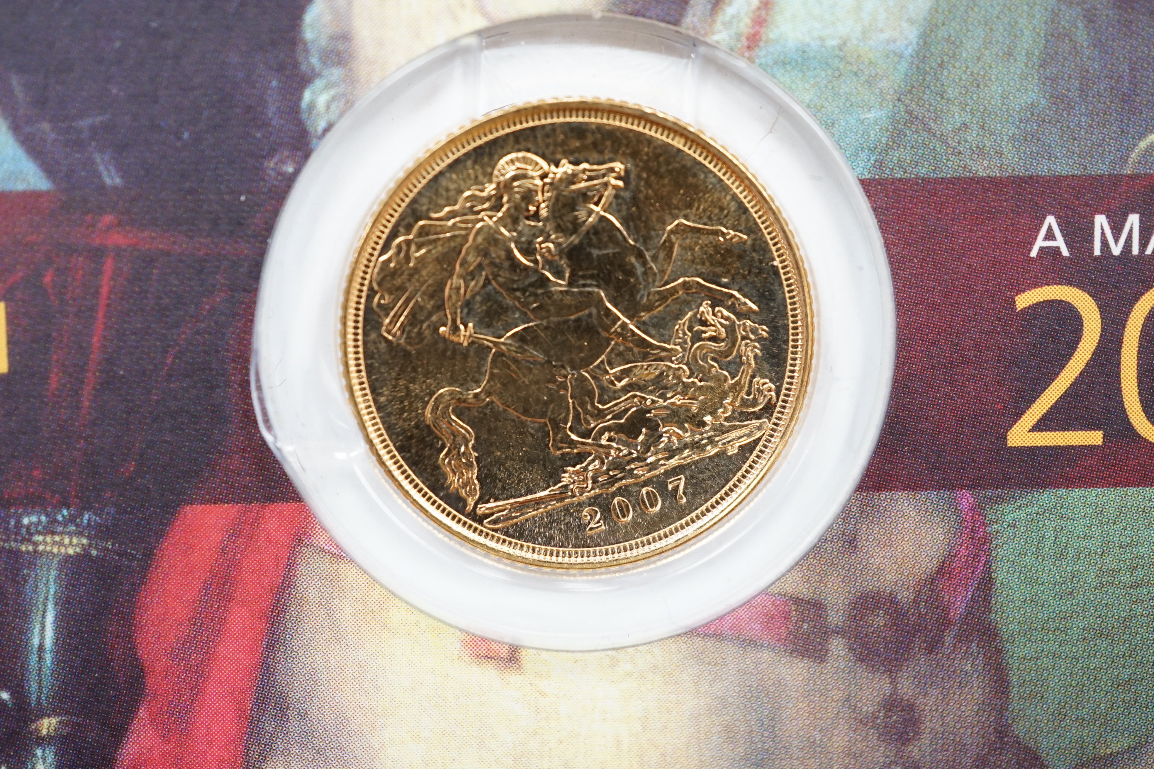 British gold coins, Elizabeth II, 2007 Gold bullion sovereign St. George & The Dragon, BUNC, Royal Mint card